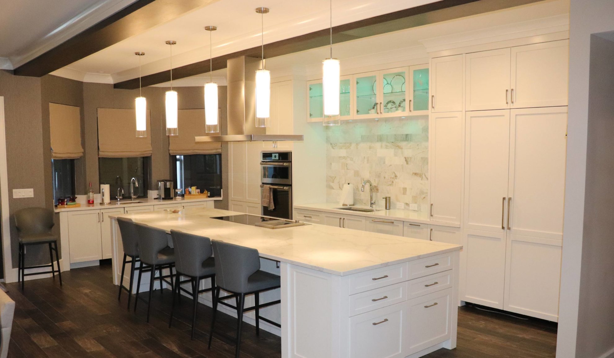 residential property kitchen interiors remodeled with new white cabinets and countertops palm beach fl